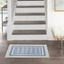 Ivory and Blue Geometric Area Rug